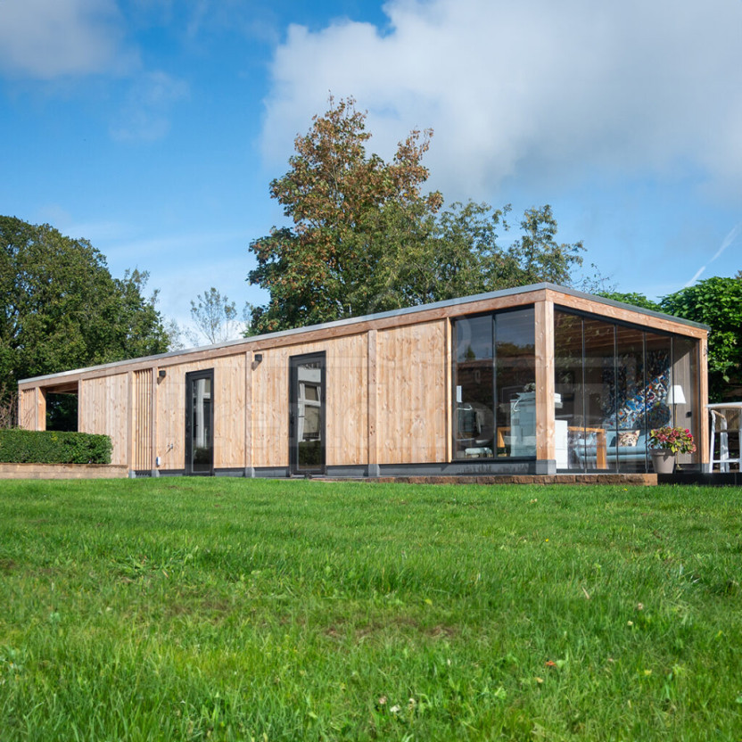 Trendhout-Palermo-XXL-modern-douglas-houten-tuinkantoor-met-schuur-en-dubbele-carport-op-laten-maken-bouwen